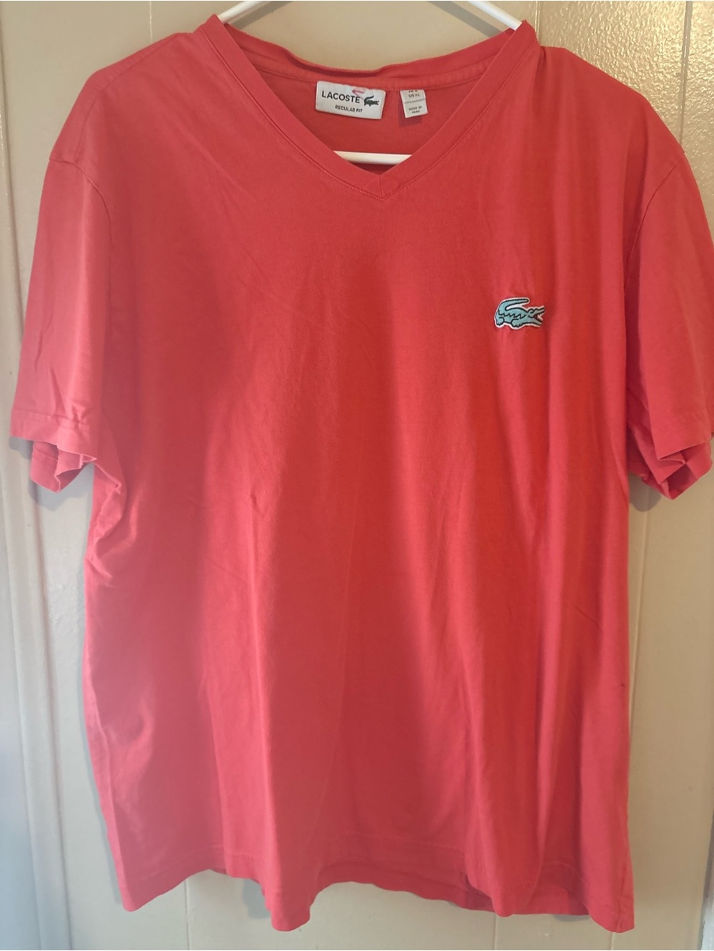 Lacoste Men’s V-Neck Polo Tee in Coral